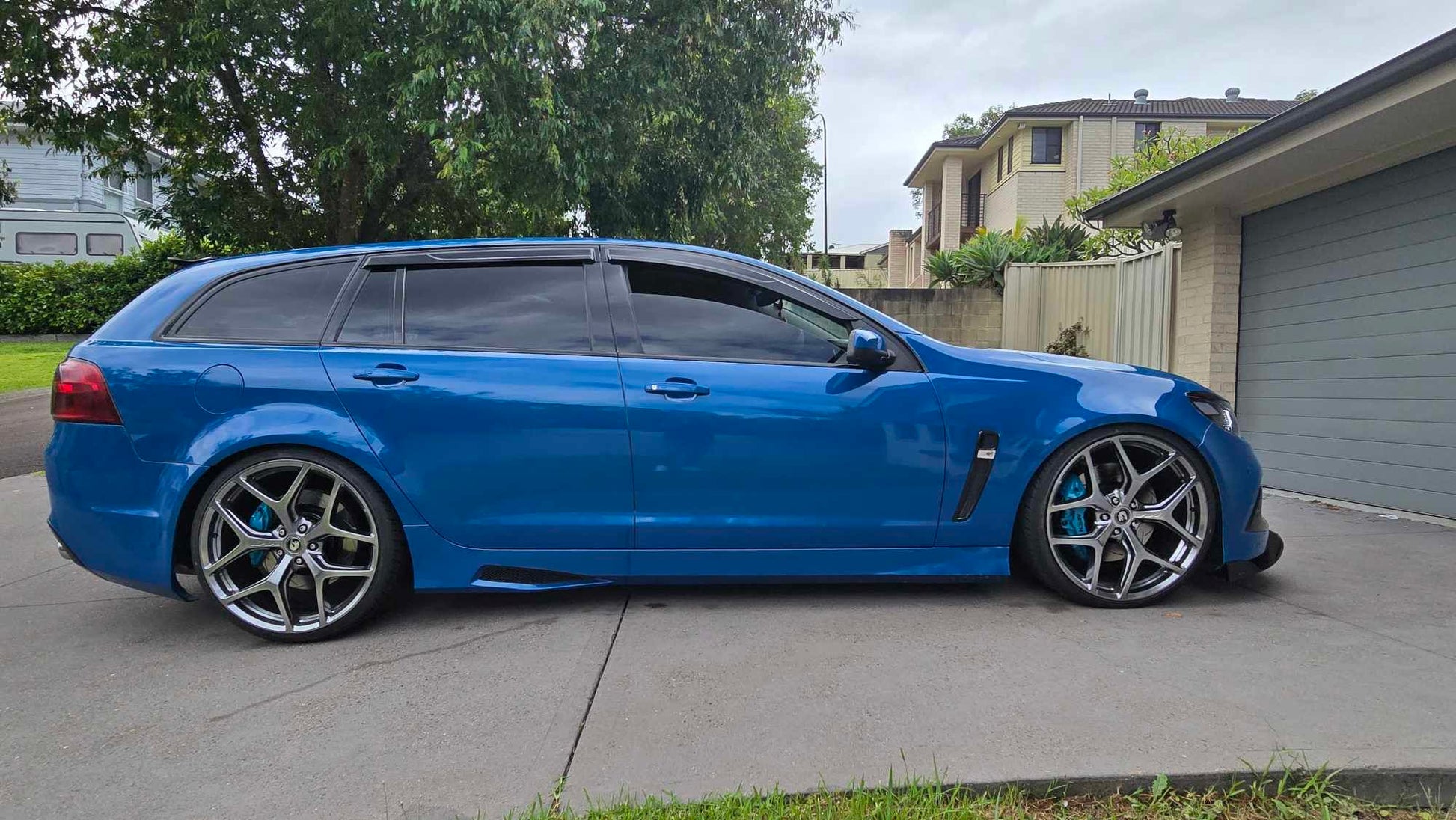 6 pot Brembo fronts and 4 pot rears painted in Porsche Miami blue installed on a VF Commodore 2